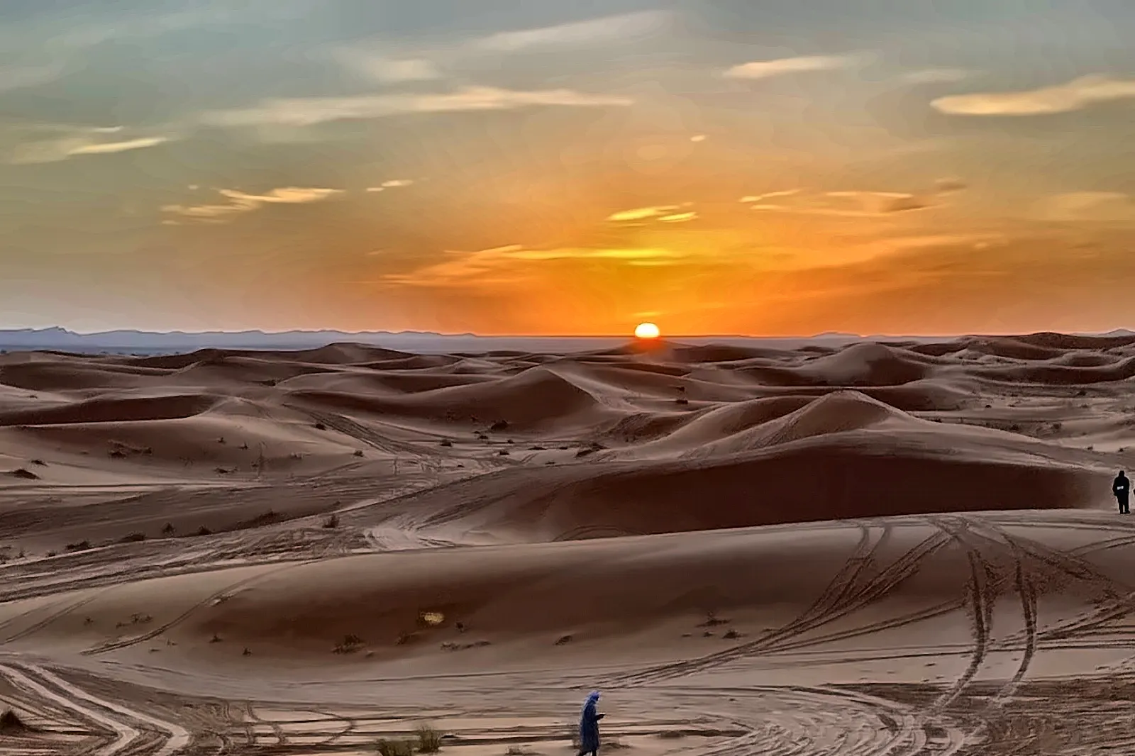 Il sole che cala dietro le dune dell’Erg Chebbi